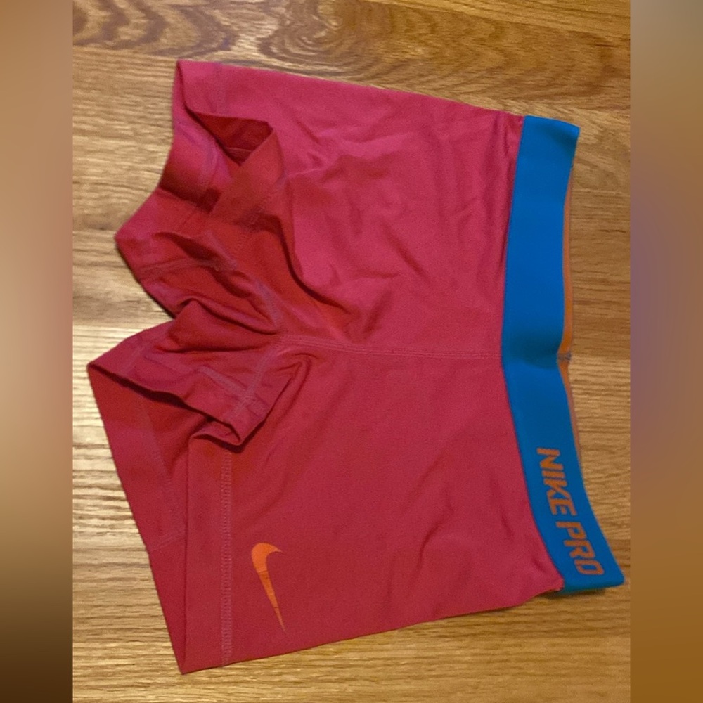 Pink Nike Pro spandex shorts.